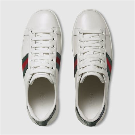 gucci low tops with designs on side|Gucci designer low top sneakers.